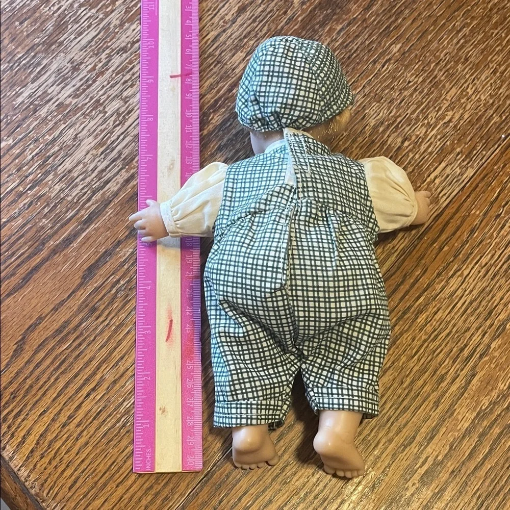 Adorable Baby Doll with Checkered Overalls